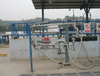 Rail car loading arm
